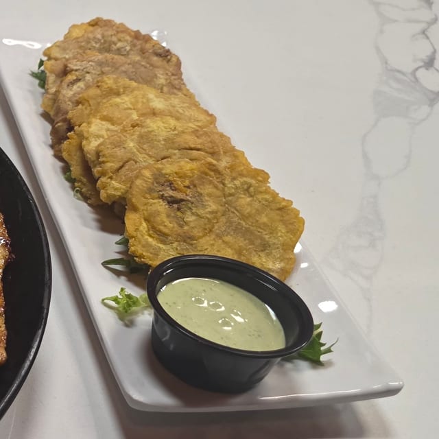 Fried Green Plantain (Tostones).